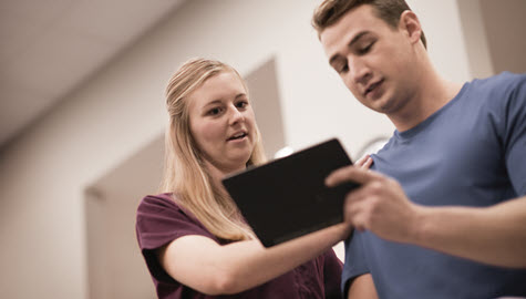 Health care worker with patient